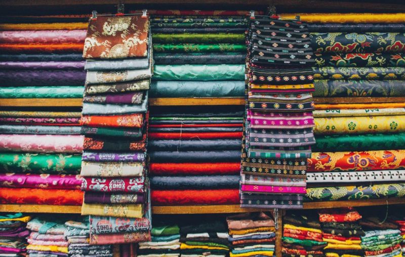 folded fabrics in a market in Bhutan