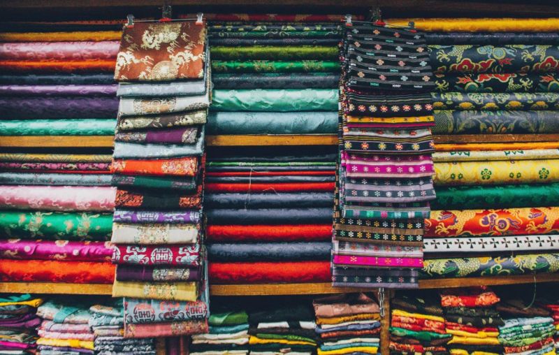 folded fabrics in a market in Bhutan