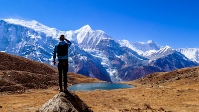 Trekker looking at mountain view in Nepal