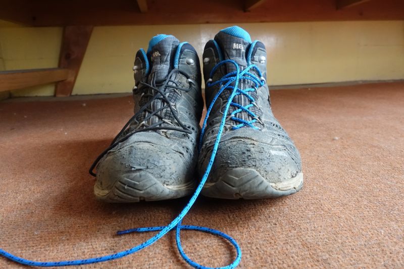 Muddy trekking boots on EBC trek in teahouse room