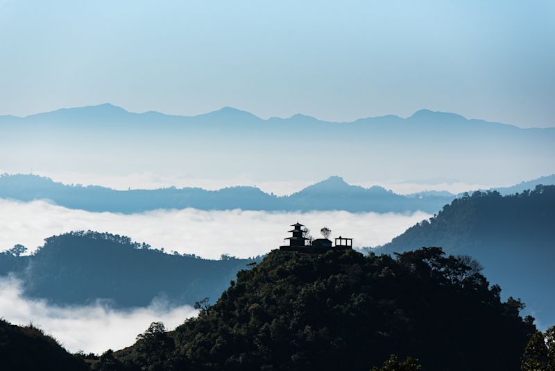 Pokhara hills and clouds and temple