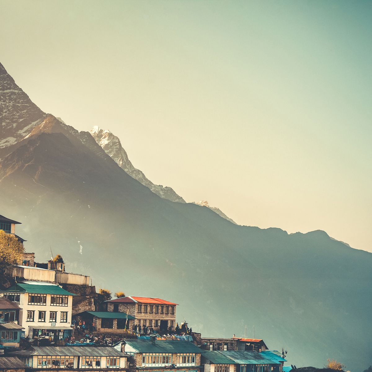Sunrise view of Namche Bazaar village and Thamserku mountain, Khumbu valley, Nepal. Trekking route to Everest Base Camp, Himalayas.