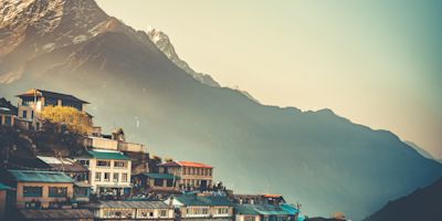 Sunrise view of Namche Bazaar village and Thamserku mountain, Khumbu valley, Nepal. Trekking route to Everest Base Camp, Himalayas.