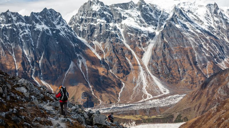 Trekker desending from Larkya Pass on Manaslu Circuit, Nepal