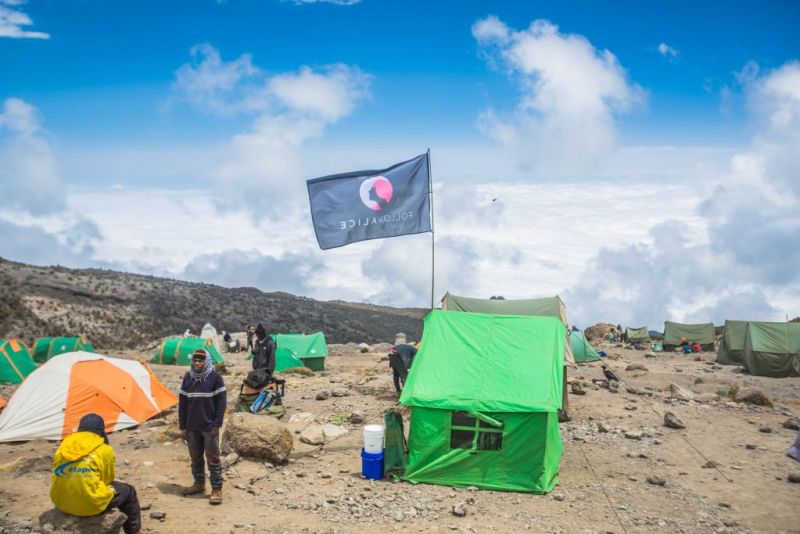 Follow Alice set up camp on Mount Kilimanjaro
