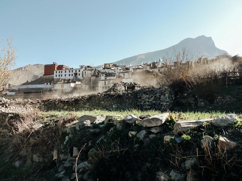 Town on Annapurna circuit with mist, Annapurna Circuit packing list