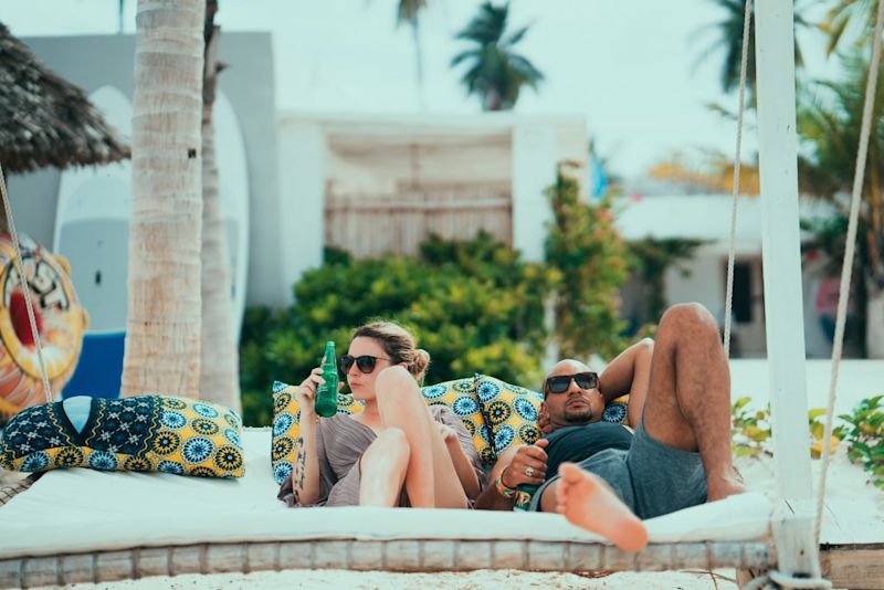 Couple lounging outside in Zanzibar, Tanzania safety