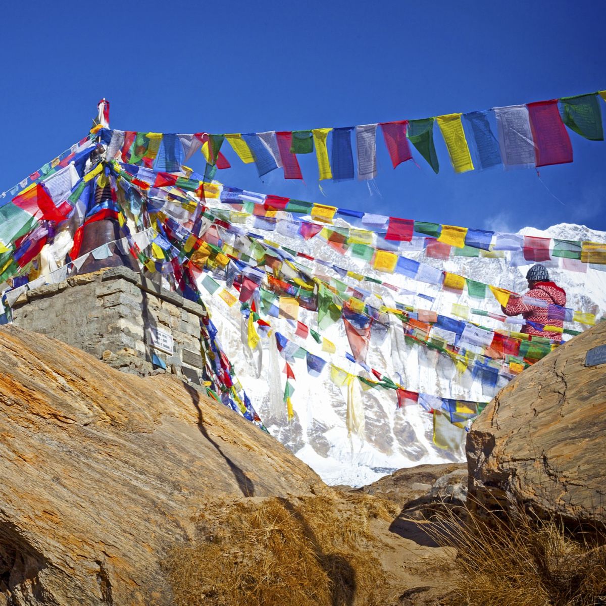 Prayer flags off stupa on Annapurna Circuit, Nepal's Himalayas