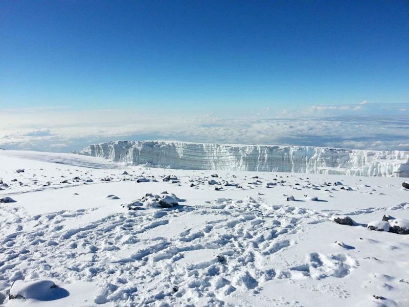 Footprints in the snow on the summit of Kilimanjaro