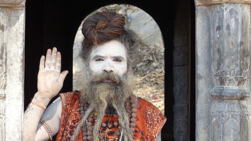 Nepal Kathmandu man guru sage beard paint