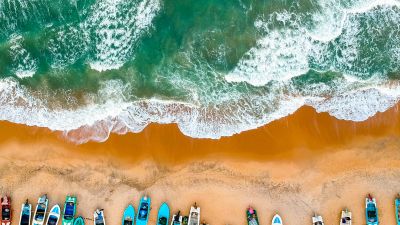 Aerial view of small boats on Sri Lankan beach