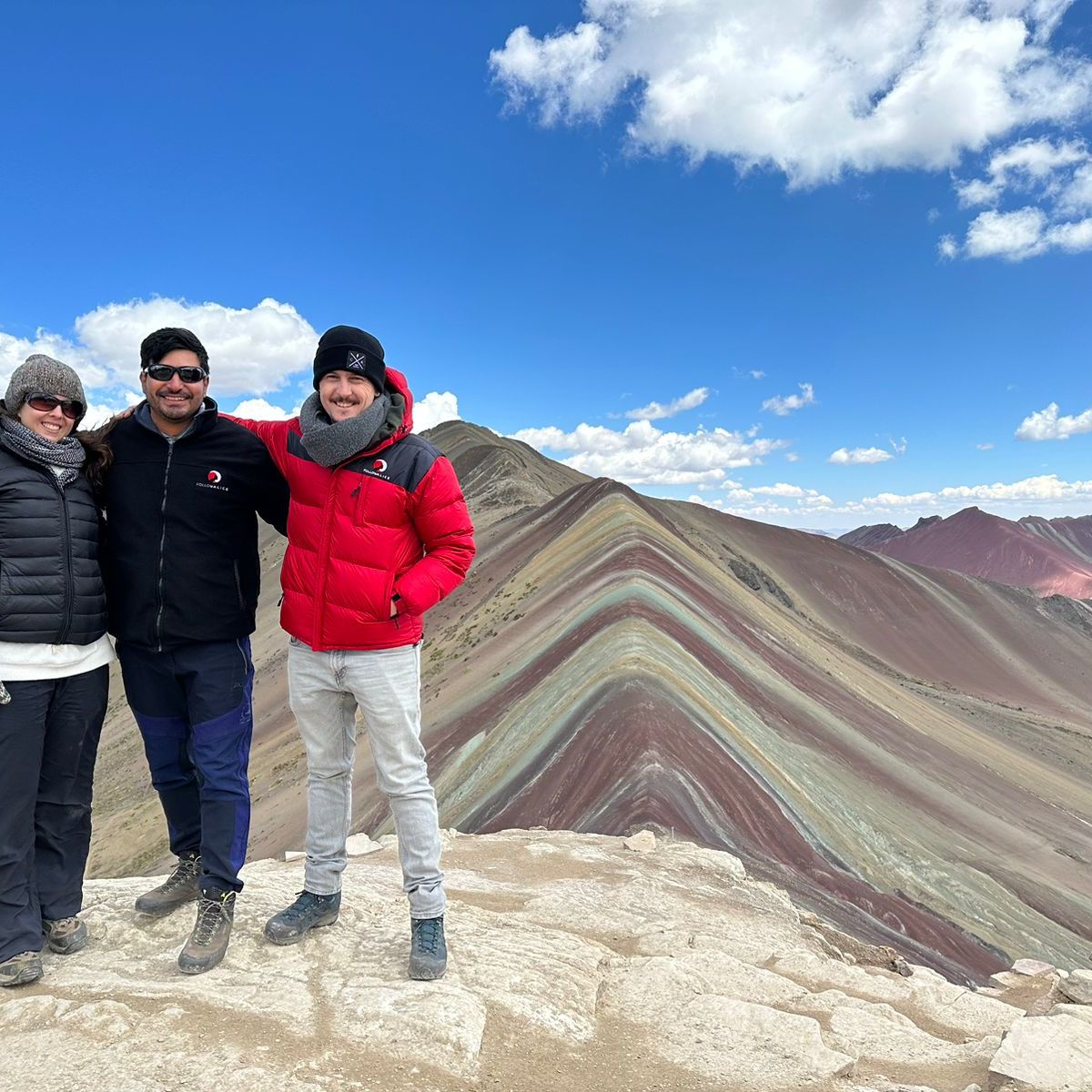 Happy hikers at Rainbow Mountain, Peru