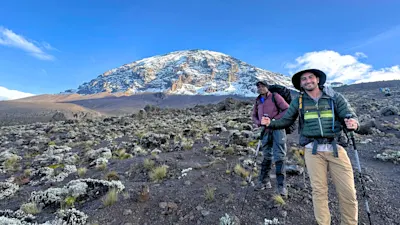 Trekkers climbing Mount Kilimanjaro