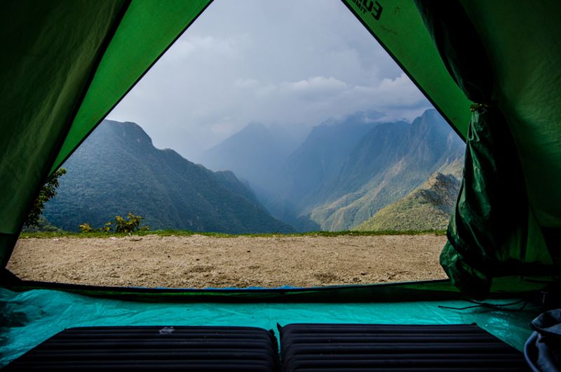 View from inside a sleeping tent of Andes Mountains on Inca Trail trek in Peru