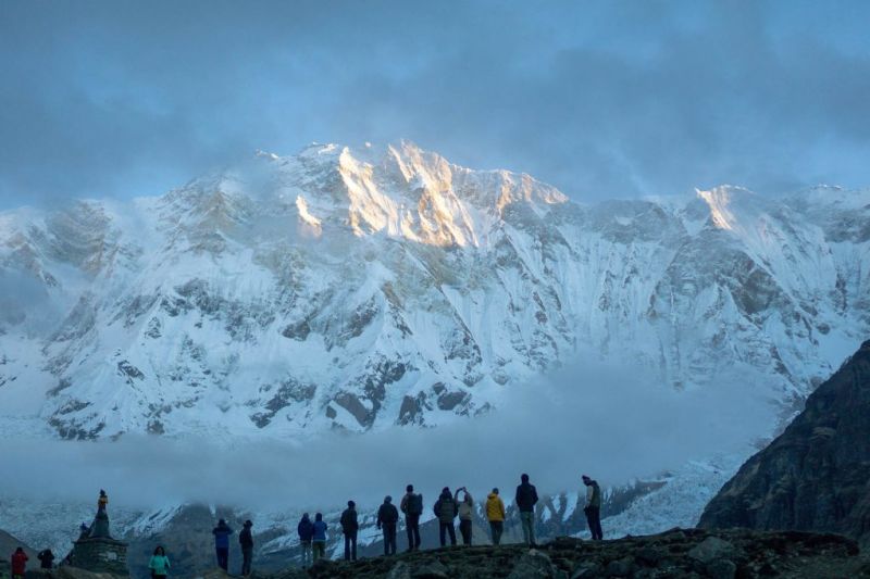 Annapurna Circuit with trekkers and snow-capped mountain