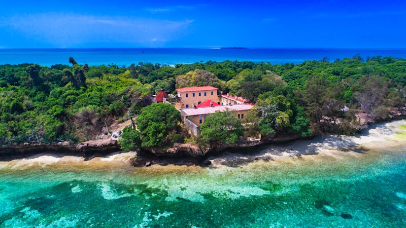 Aerial view of Prison Island with its pink prison building in Zanzibar, Tanzania.