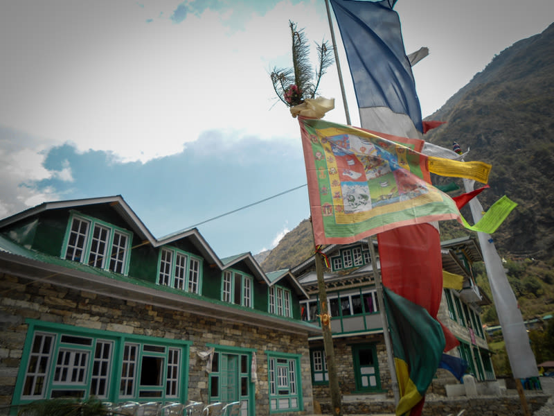 Colourful flags in front of a lodge/teahouse on EBC Trek, Nepal