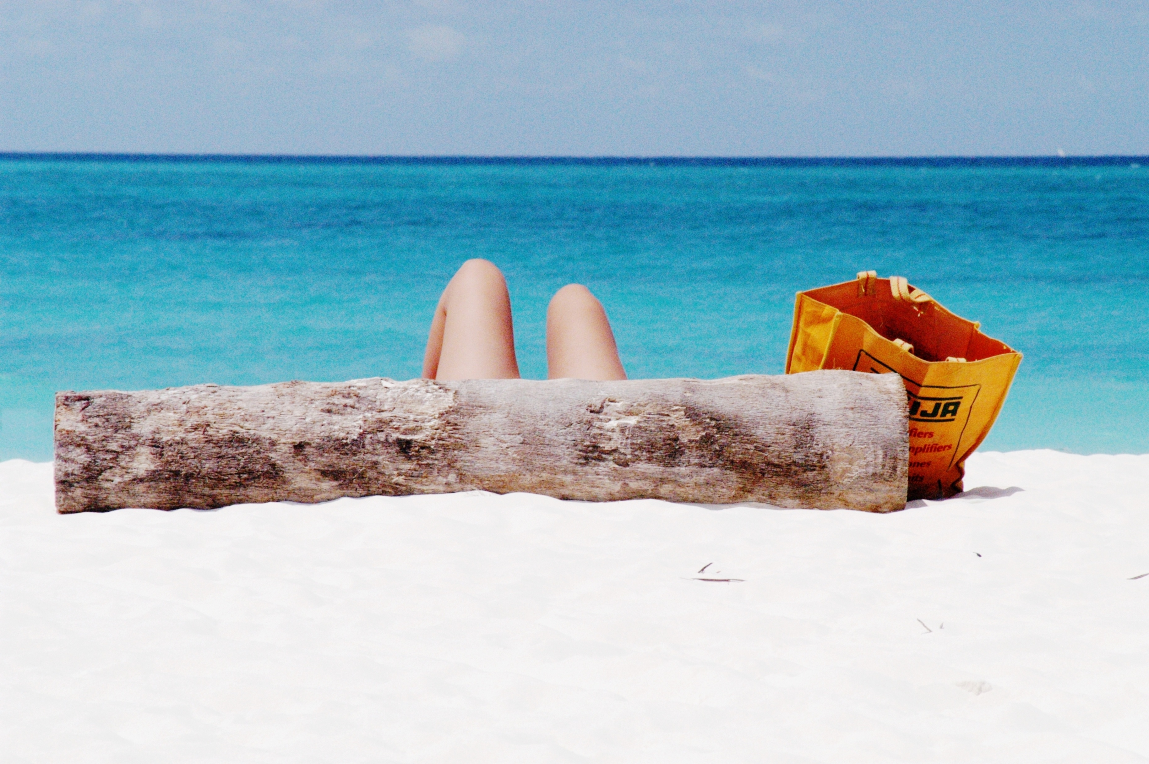 Sun-bathing on Kendwa Beach, Zanzibar Island off the coast of Tanzania, Africa