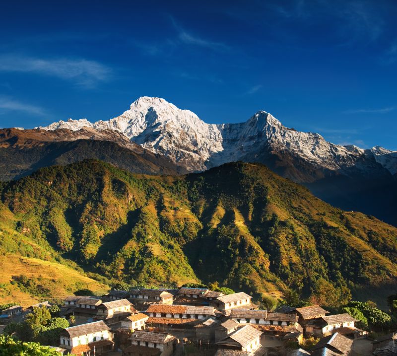 Landscape with village and Mount Annapurna South, Nepal