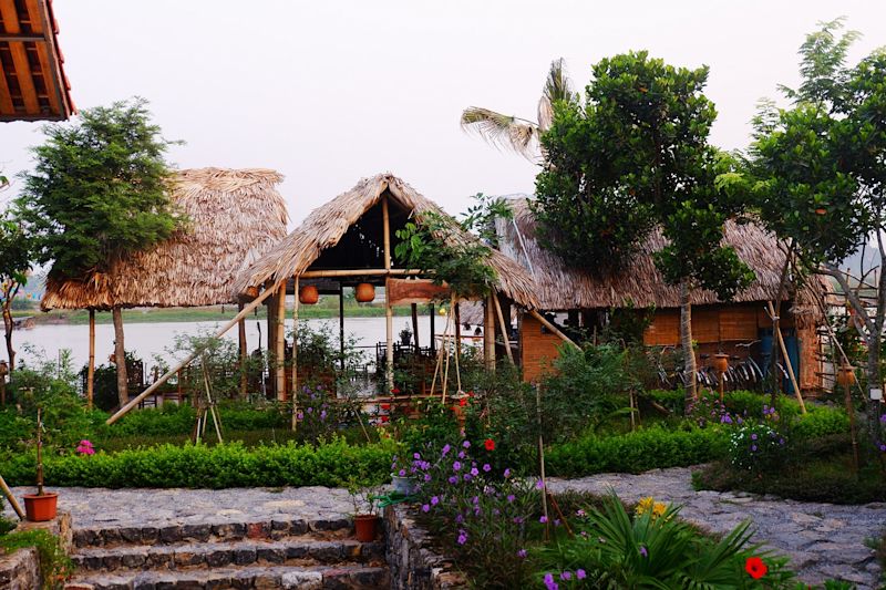 Riverside thatched home and garden