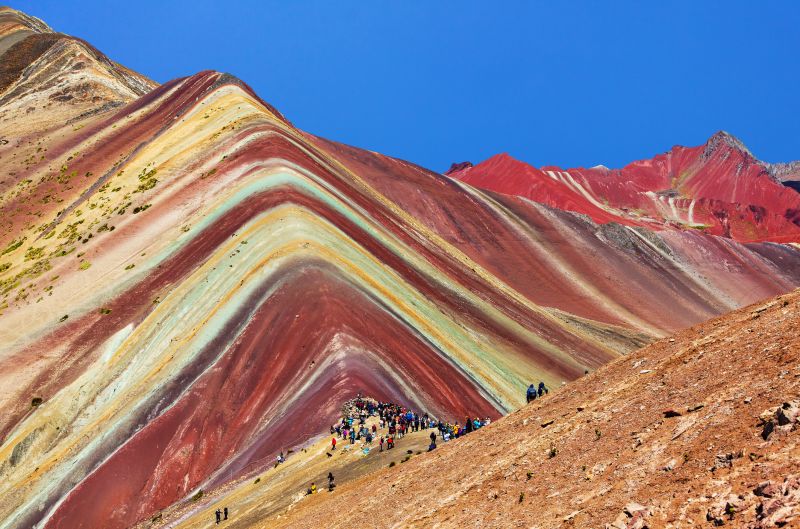 Rainbow mountain or Vinicunca Montana de Siete Colores and beautiful sky, Cuzco or Cusco region in Peru, Peruvian Andes mountains