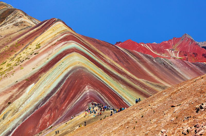 Rainbow mountain or Vinicunca Montana de Siete Colores and beautiful sky, Cuzco or Cusco region in Peru, Peruvian Andes mountains