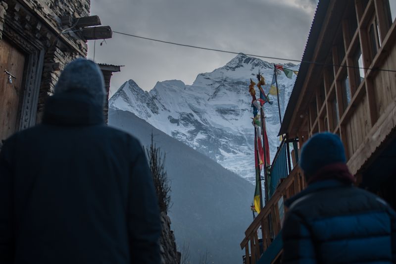 Street-level view of Himalayas in Upper Pisang, Annapurna Circuit, Nepal