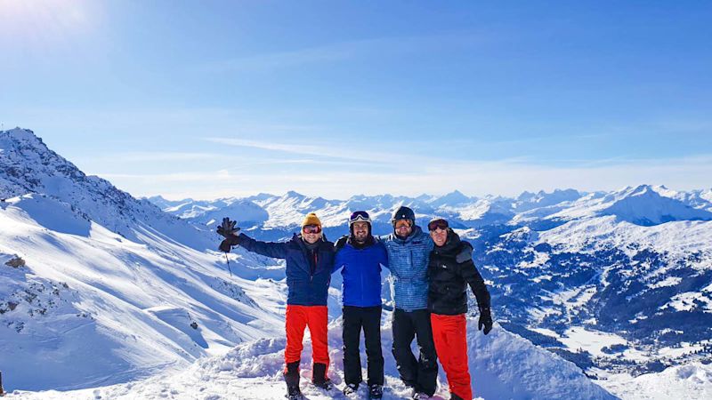 Friends smiling on ski weekend - group