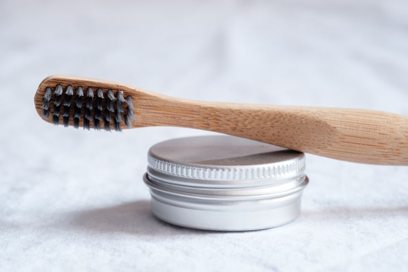 Bamboo toothbrush zero-waste toothpaste sustainable travel