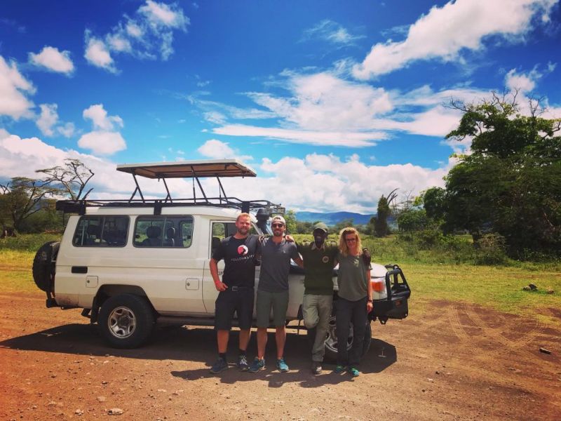 Kazi and travellers by safari vehicle in Tanzania, Is Tanzanai safe?