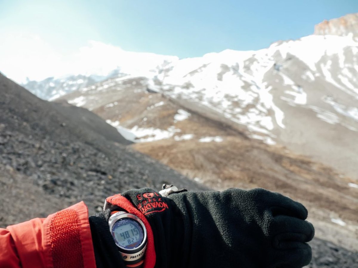 Man on Annapurna circuit who packed gloves and watch for trek