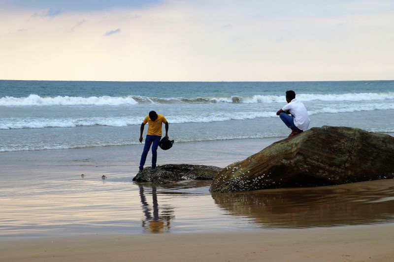Two Indian guys at the beach in Sri Lanka 