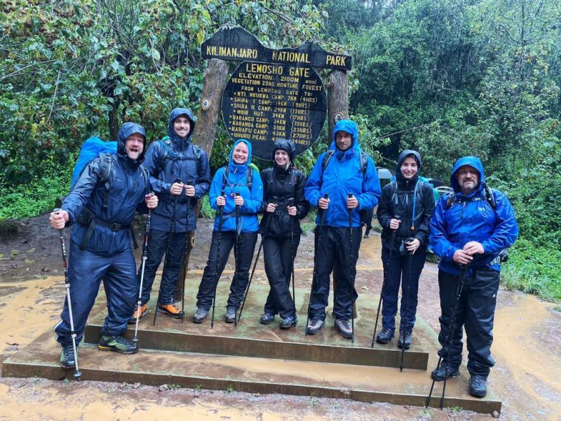 Lemosho Gate Kilimanjaro group photo rain
