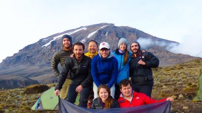 Kilimanjaro group with Follow Alice flag
