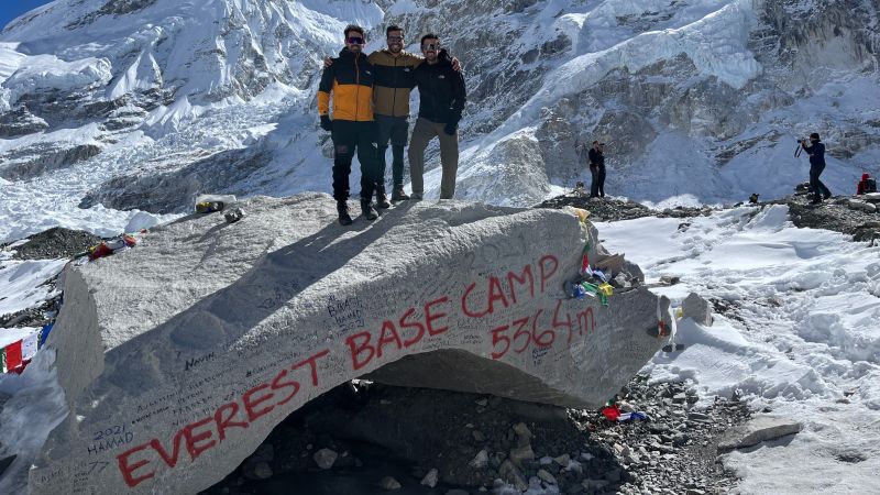 Ours. Everest Base Camp trio on rock