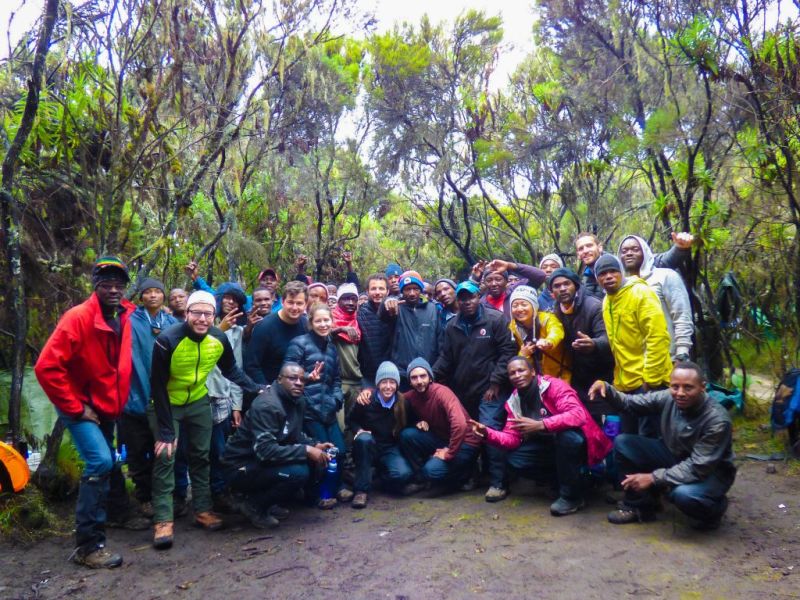 Group photo in forest, Kilimanjaro routes