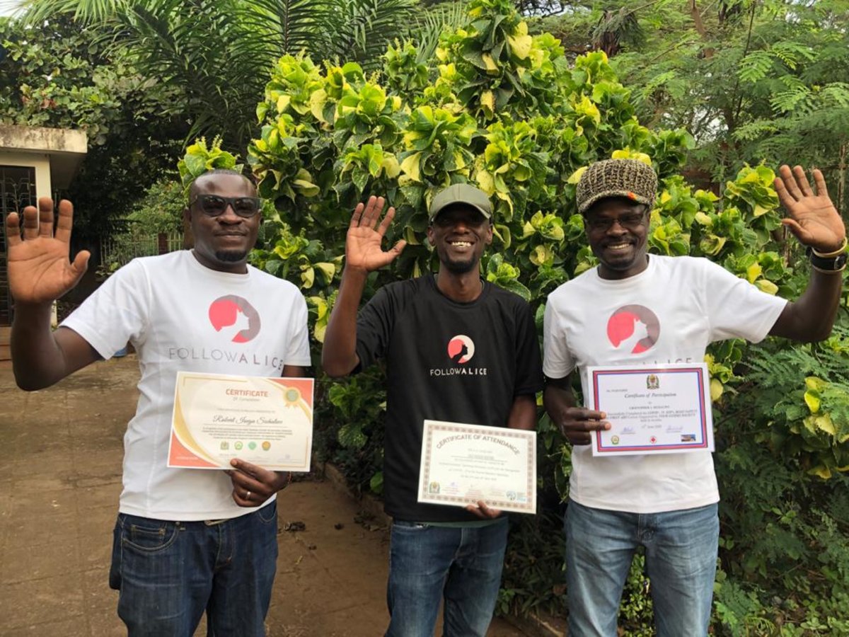 Chris, Bobu and Kazi with coronavirus certificates