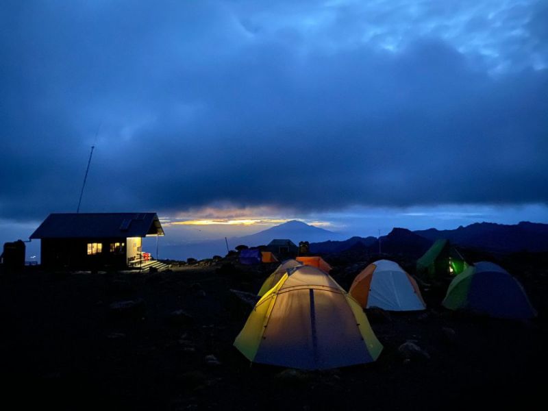 Tents at campsite at night on Kilimanjaro