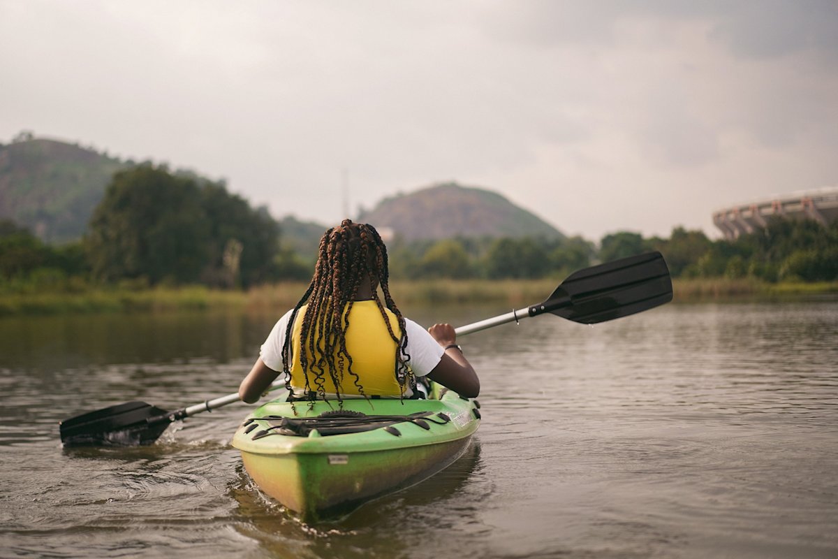 Black woman kayaking nature
