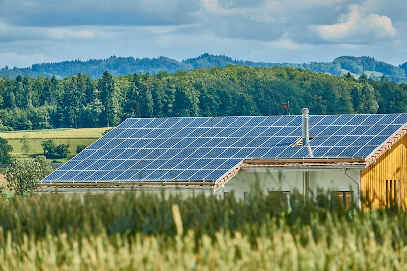 Roof of solar panels in countryside