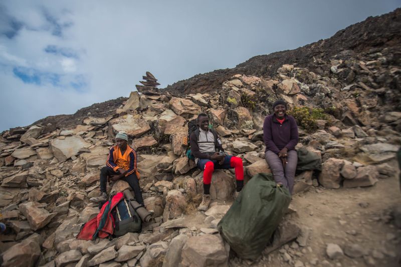 Porters on Kilimanjaro taking a break