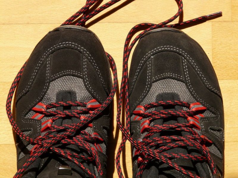 Close up of synthetic hiking boots with long red shoelaces, best hiking boots for Kilimanjaro