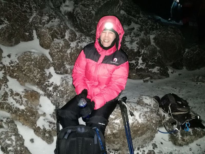 summit night smiling woman