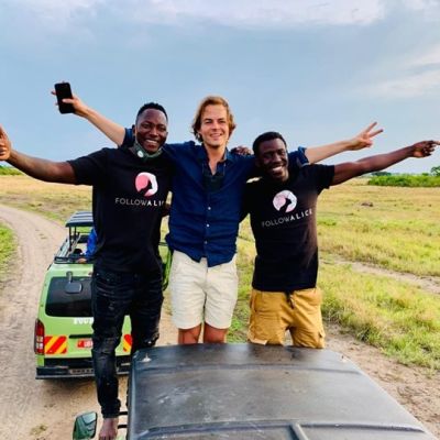 Happy client on serengeti safari with team
