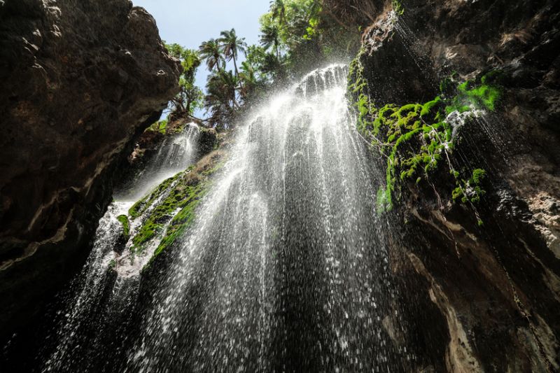 lookin gup at Ngero Sera Waterfall