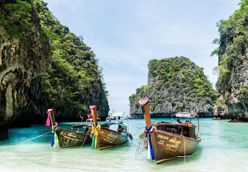 Thailand boats blue sea stacks