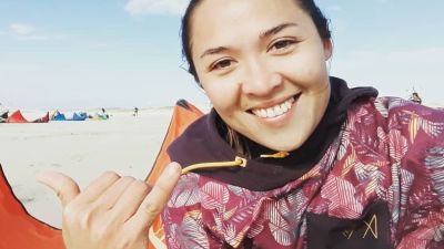 Iris, Follow Alice ambassador, at the beach kitesurfing
