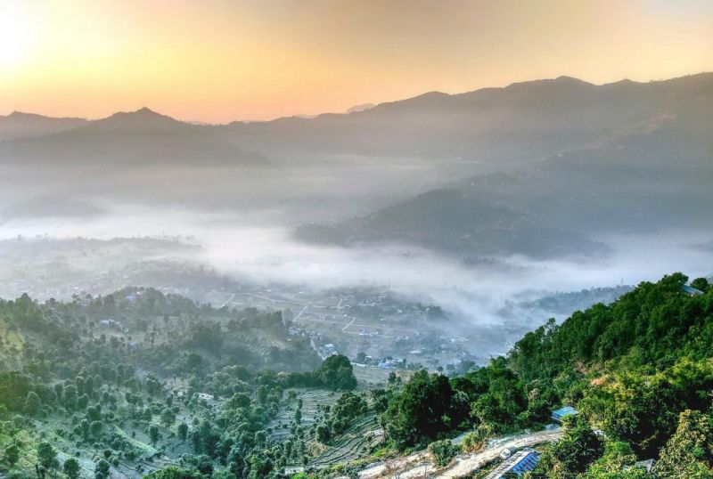 beautiful valley settlement in mist in Nepal 