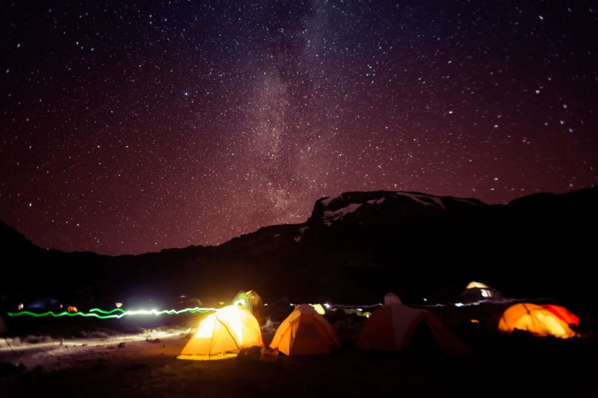 Barranco camp at night with tents lit up from within