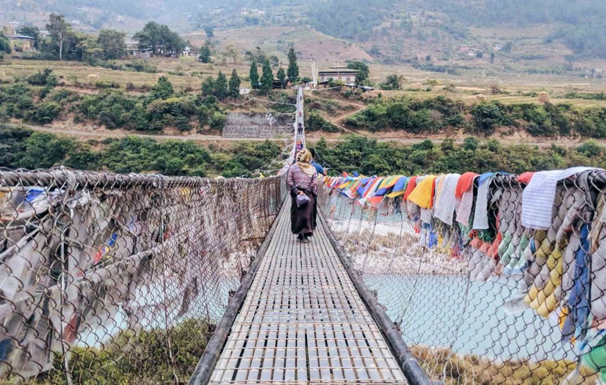 Prayer flags on bridge in Bhutan